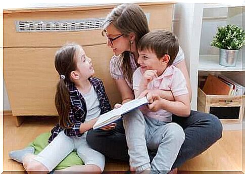 mother reading to stimulate the language of her children