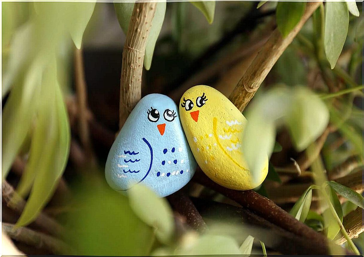 Two painted stones look like birds