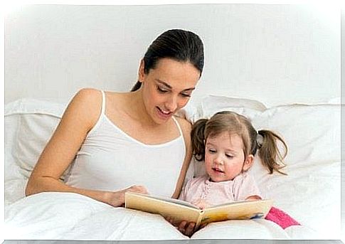 mother reading to her daughter 