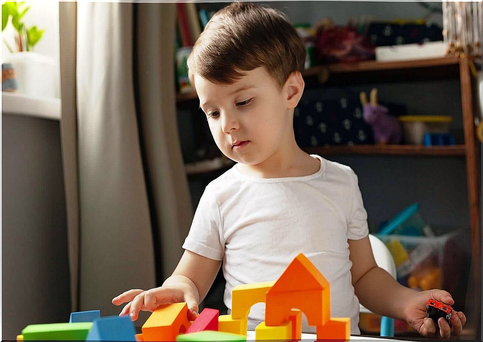 A child playing with building blocks