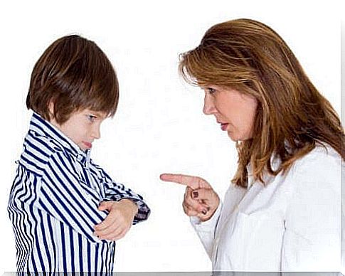 mother scolding boy