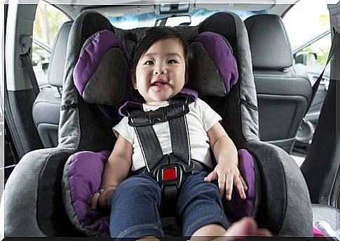 Little girl in car seat