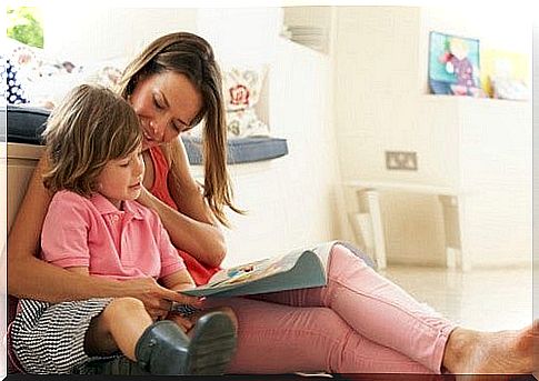 mother reads with child