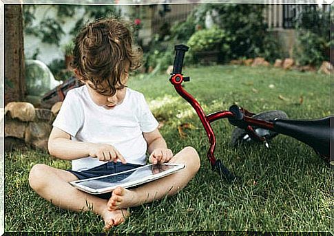 toddler with a tablet