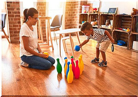 mother and child playing with cones