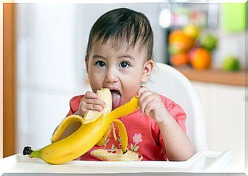 baby eating a banana