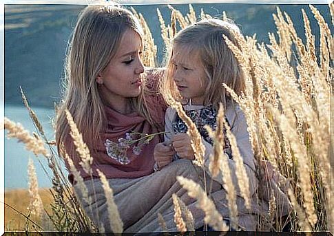 Mother talking to daughter