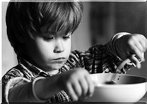 child eating by bowl