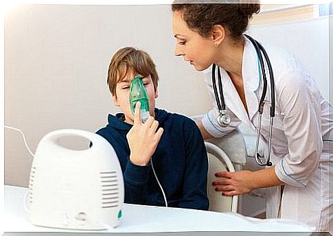 A boy is being examined by a pediatrician