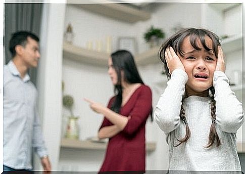 parents quarrel in front of crying daughter