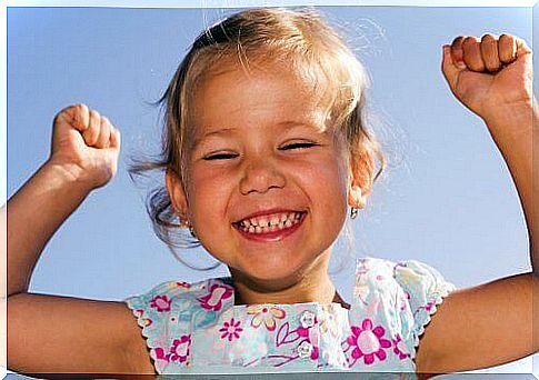 Smiling girl is an example of optimistic children