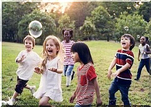 children playing with bubbles