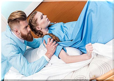 man helping woman during childbirth