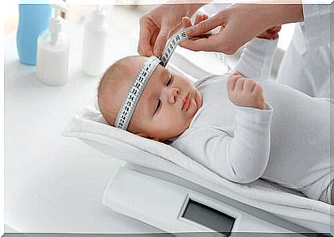 baby being measured around the head