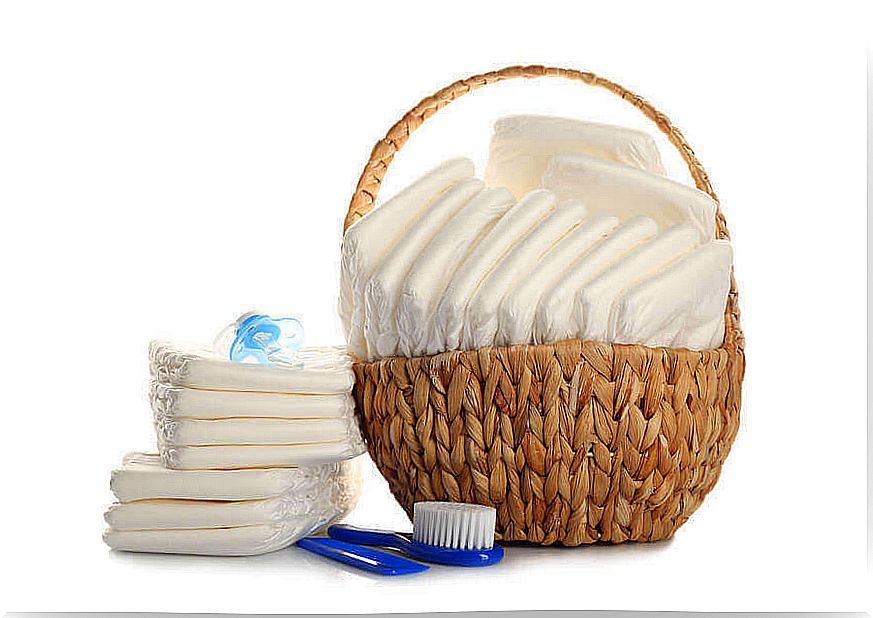 wicker basket with diapers