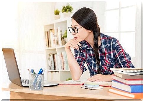 Woman studying on her computer 